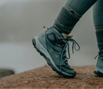 Pair of sturdy brown hiking boots designed for mountain trails